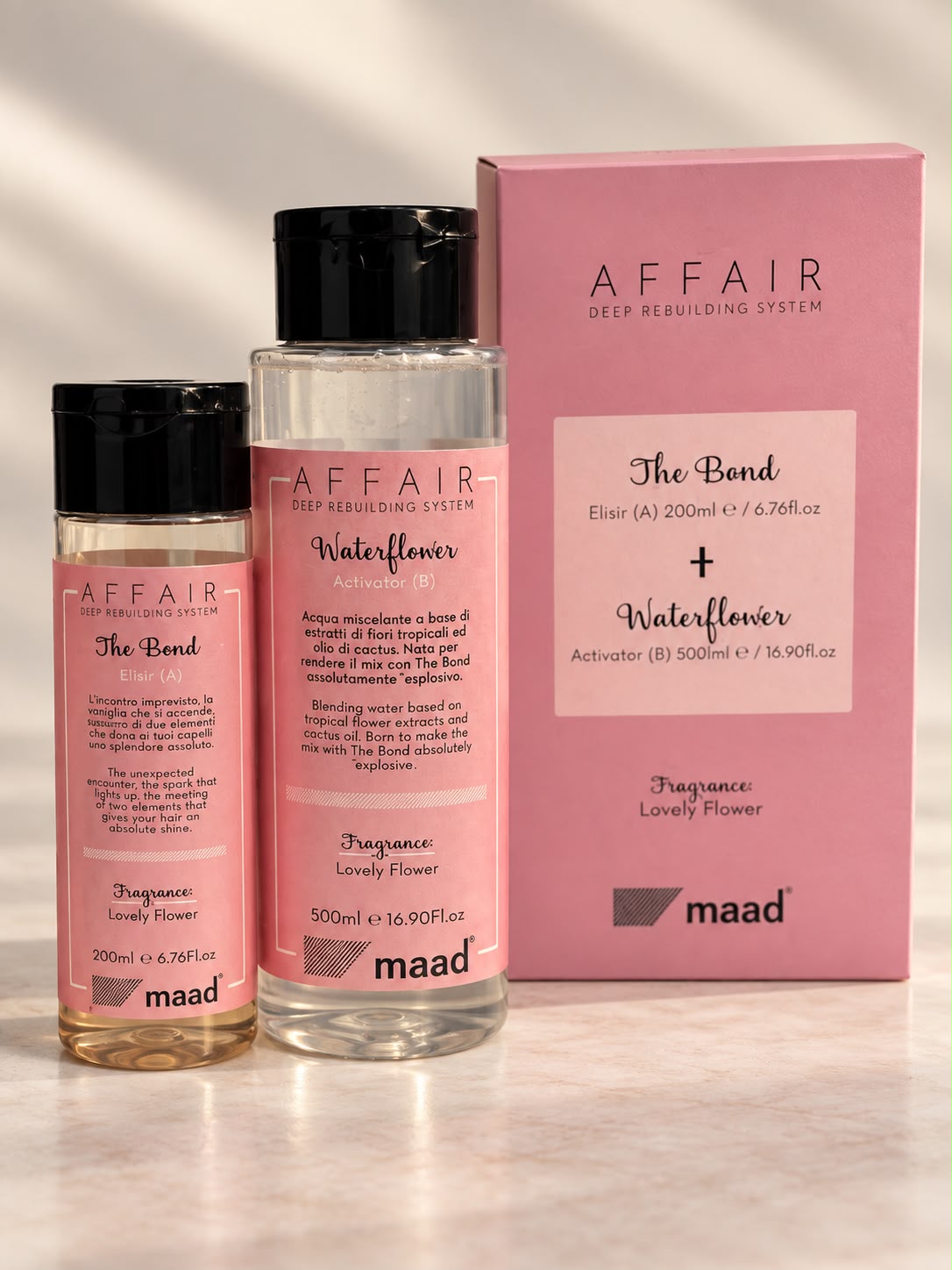 maad AFFAIR The Bond Elixir A 200 ml and Waterflower Activator B 500 ml bottles beside pink set box